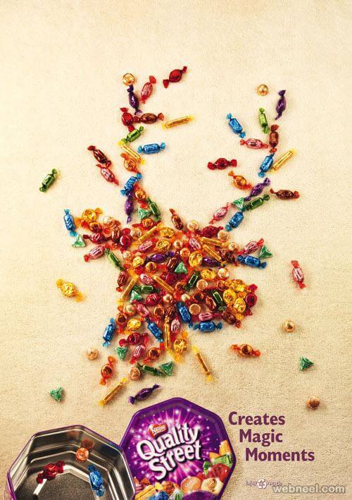 Vianočná reklama na Nestlé - sob vyskladaný z farebných cukríkov